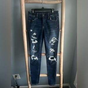 American eagles ripped dark wash jeans. Regular rise.